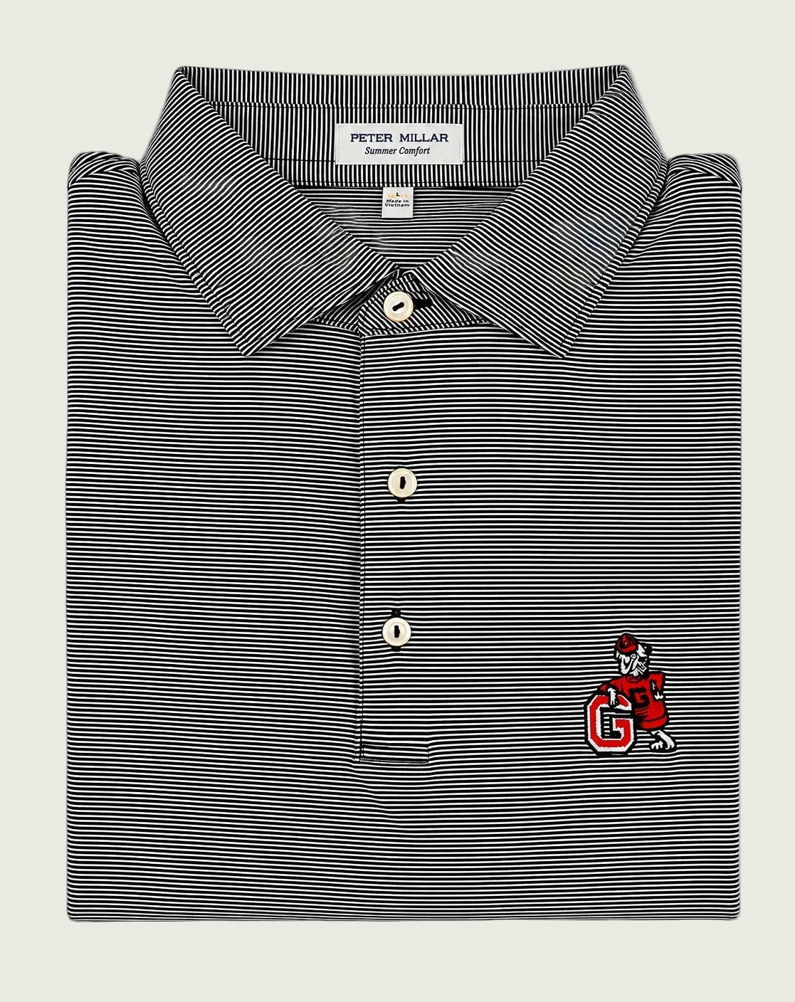 A folded Peter Millar striped polo shirt in black and white with a small red and white embroidered mascot logo on the left chest, set against a plain white background.