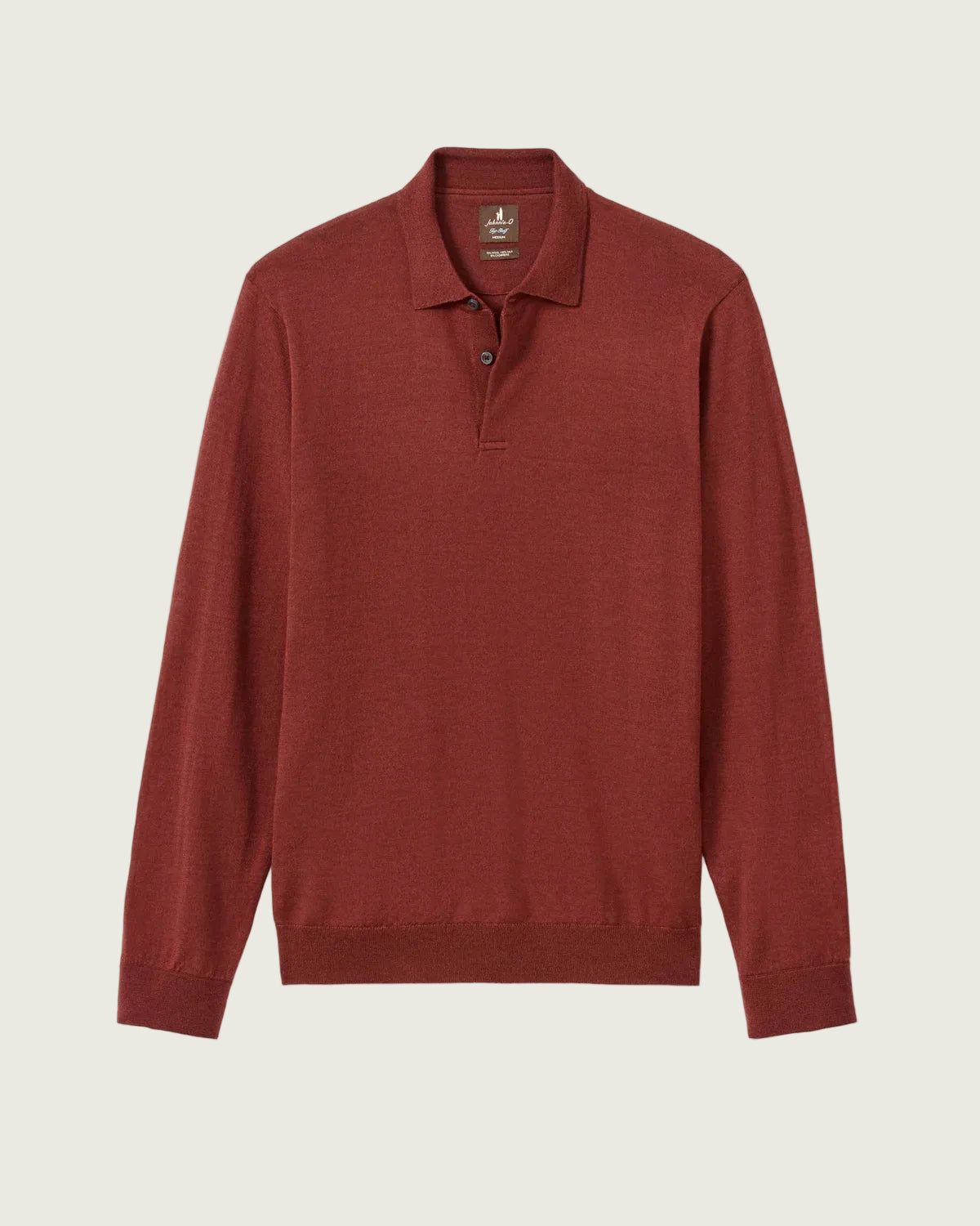 A rust-red long-sleeve polo shirt with a ribbed collar, button placket, and cuffs, displayed flat against a light gray background.