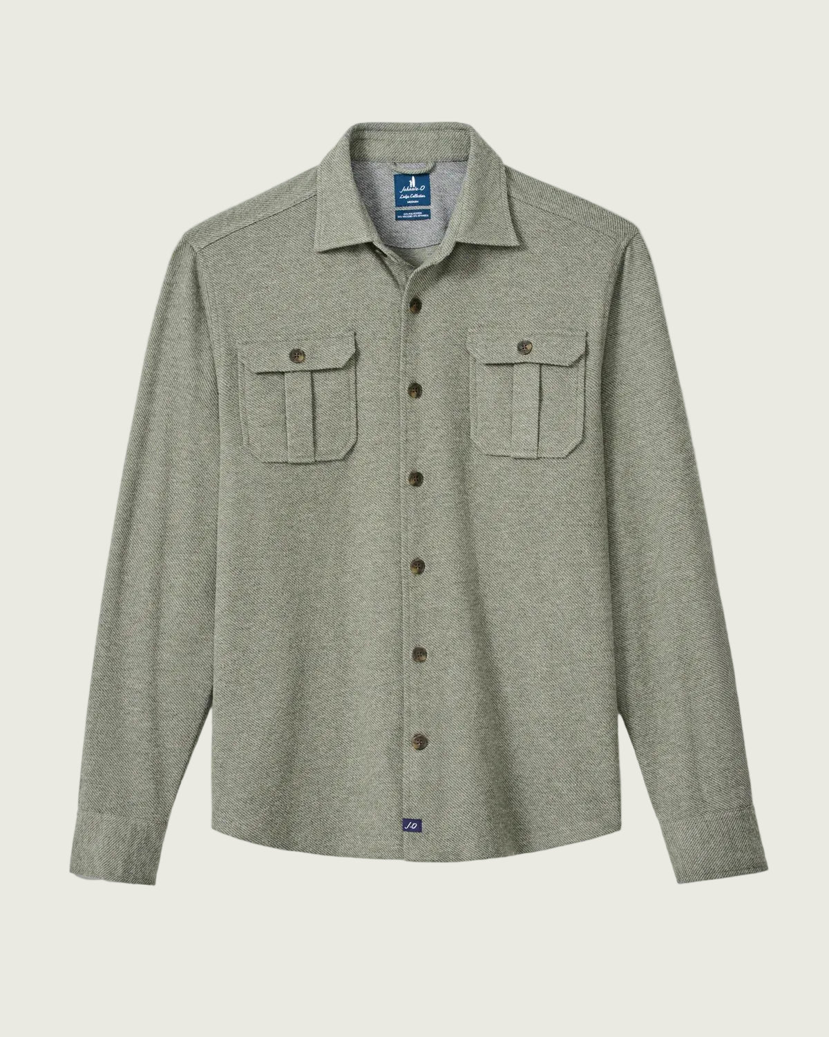 A long-sleeve button-up shirt in a heathered sage green fabric, featuring two buttoned chest pockets and a classic collar, shown against a light gray background.