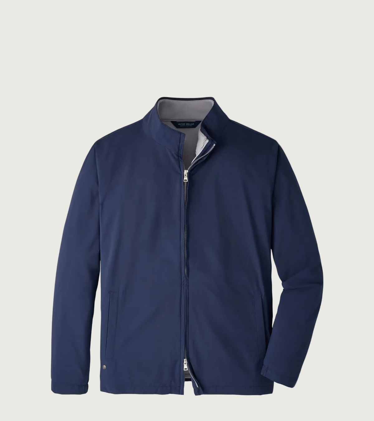 A navy blue zip-up jacket with a stand-up collar, displayed on a clean white background.