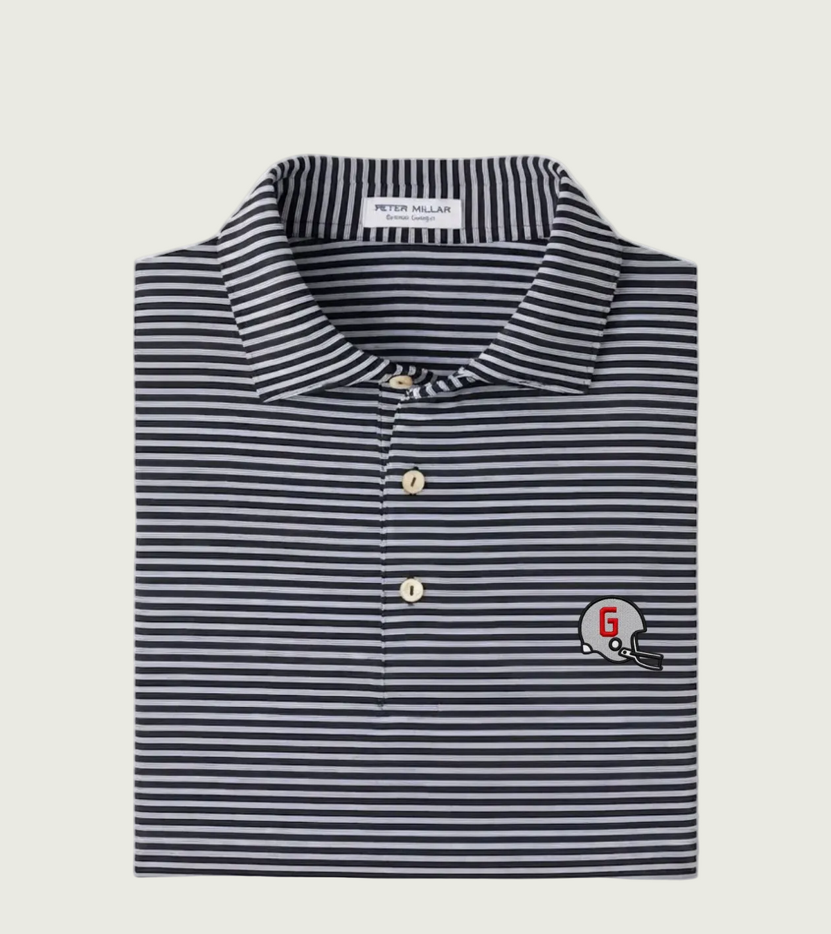 A folded Peter Millar men's polo shirt featuring navy and white horizontal stripes, with a small embroidered football helmet logo on the left chest.