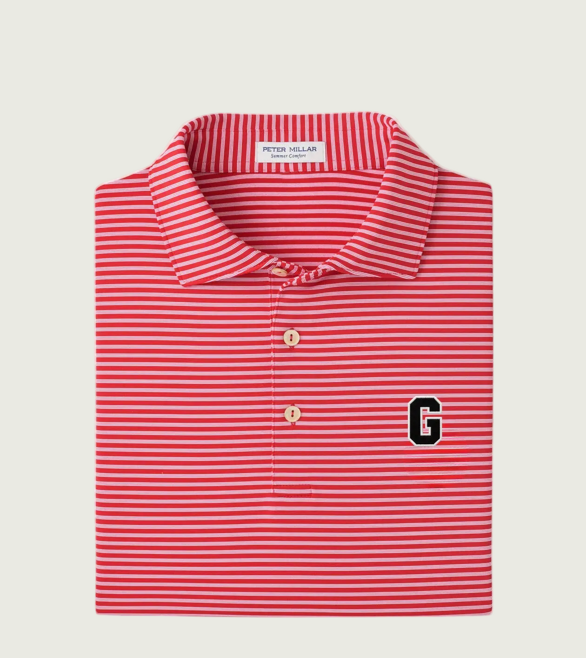 A folded red and white striped polo shirt with a collar, three buttons, and a black and white embroidered letter G on the left chest, shown on a light gray background.