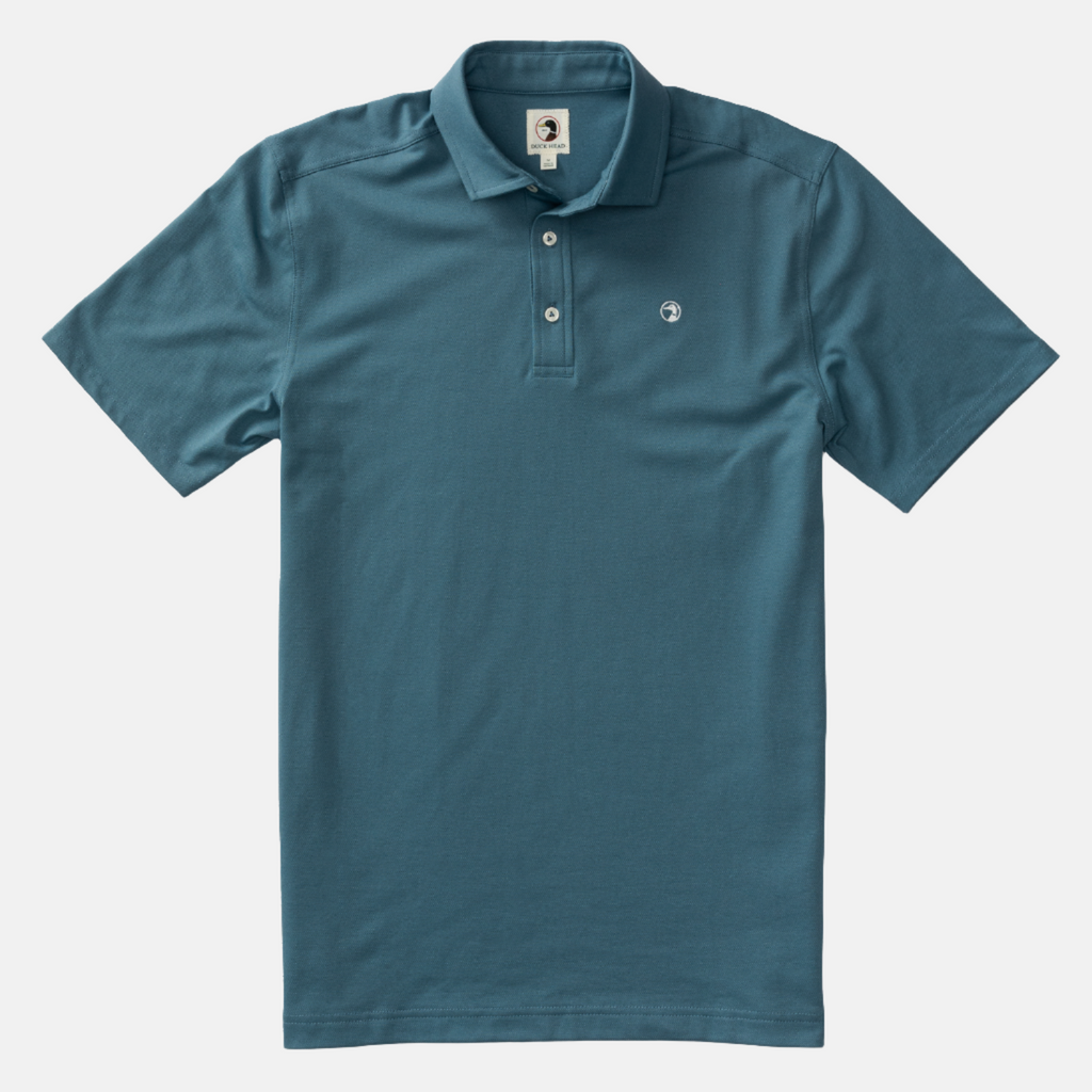 Pique polo shirt with three off white buttons in color Aegean Blue, similar to a teal.