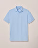 Light blue striped polo shirt on a beige background