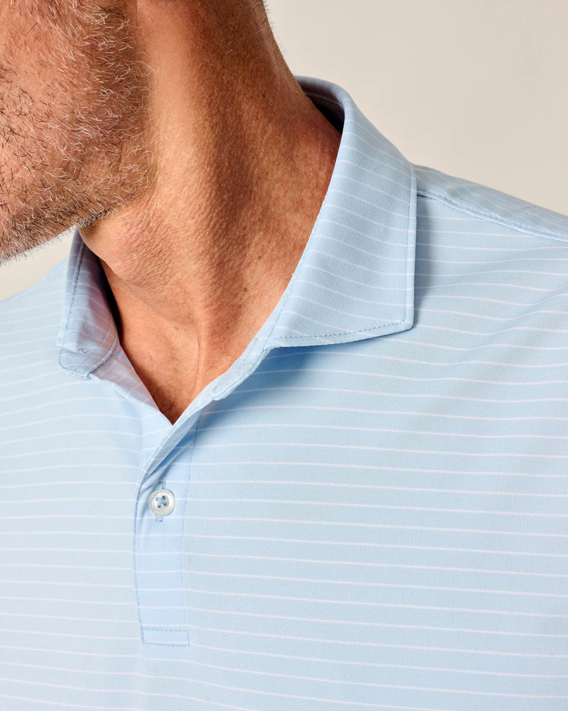 Light blue striped polo shirt worn by a person