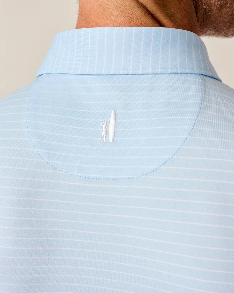 Light blue striped shirt with Johnnie-O logo at the nape of the neck on a neutral background