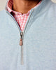 Light blue zip-up pullover with a pink plaid shirt underneath