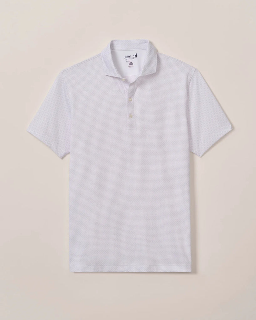 White patterned polo shirt on a beige background