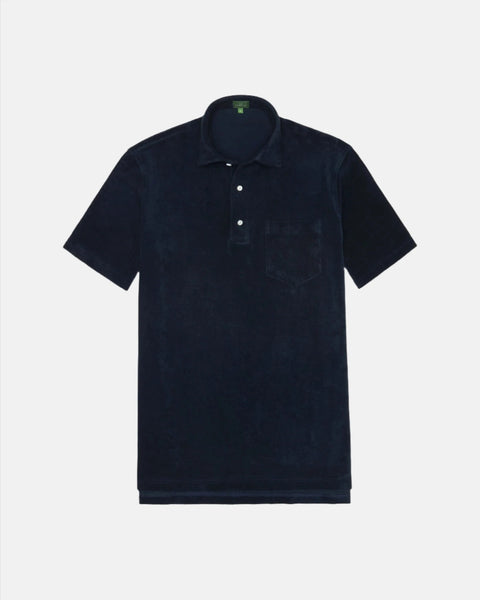 Navy cotton terry polo shirt with white buttons.